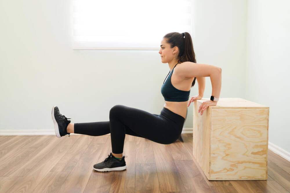Seated dips are a really easy fitness hack at your desk