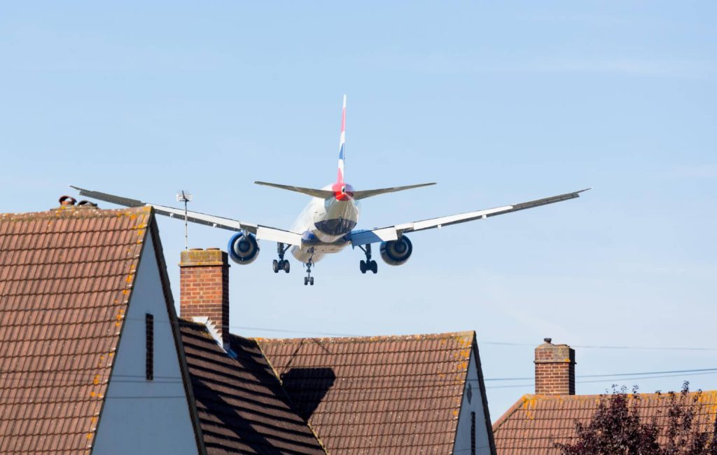 A British Airways jet lands at Heathrow airport in London